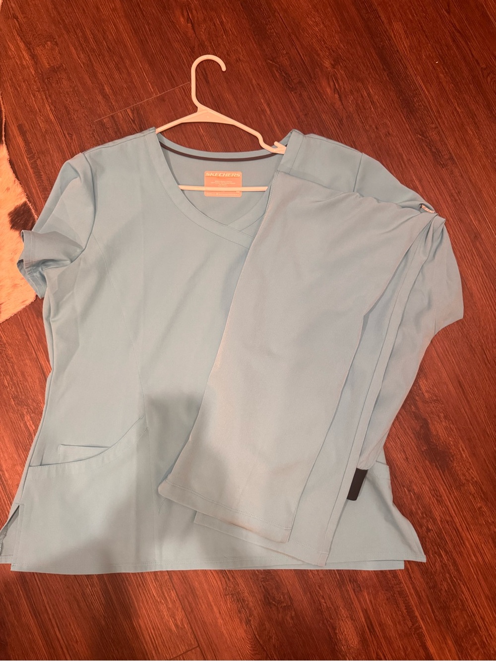 Skechers Women's Light Blue V-Neck Short Sleeve Top